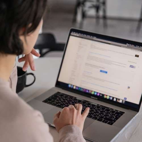 a woman using a laptop